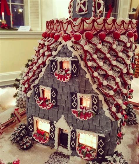 A Gingerbread House Is Decorated For Christmas