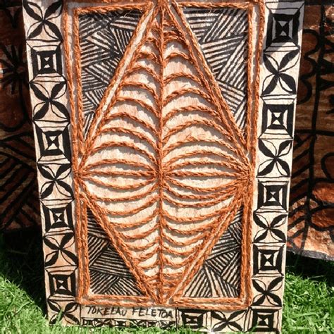 Photograph Of A Pop Up Stall Selling Kupesi Design Framed As Artwork In