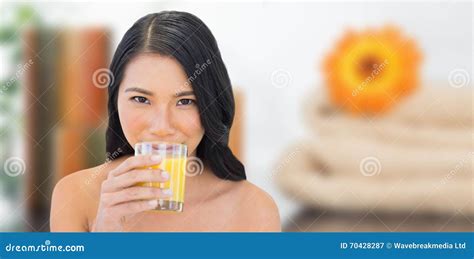 Composite Image Of Sensual Nude Model Drinking Orange Juice Stock Image Image Of Glass