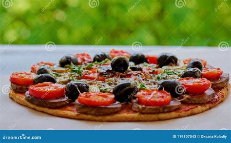 Spicy Vegetarian Pizza With Cherry Tomatoes Mushrooms Black Olives