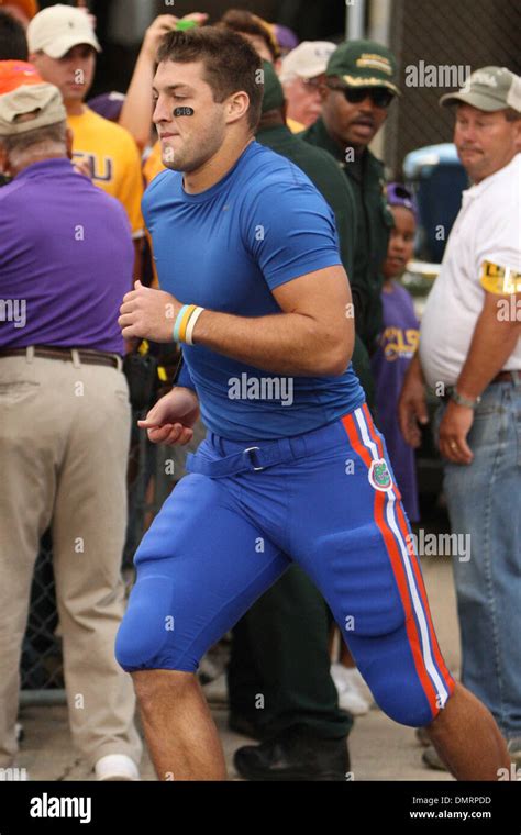 Florida Quarterback Tim Tebow Emerges From The Locker Room During The