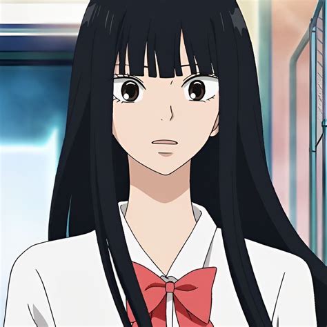 A Woman With Long Black Hair Wearing A White Shirt And Red Bow Tie