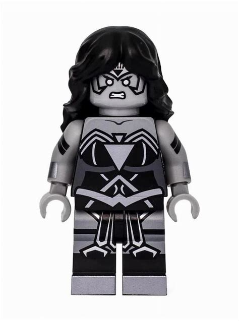 A Black And White Lego Figure With An Evil Look On It S Face