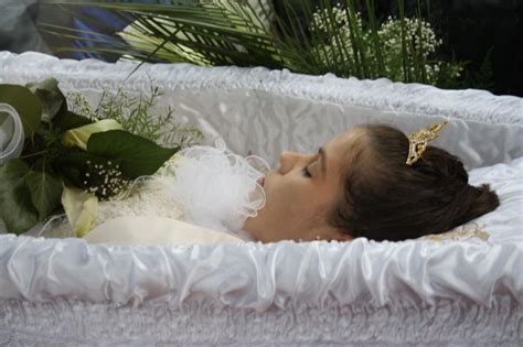 Andreea Brazovan In Her Open Casket During Her Funeral Procession