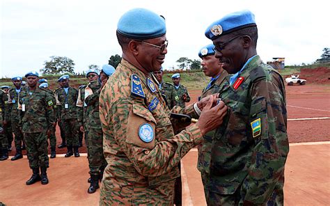 Rwandan Peacekeepers In Car Decorated With Un Service Medals Rwanda