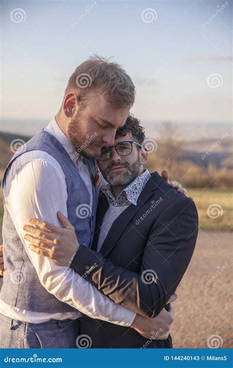 Gay Couple In Love Intimate Hugging Together Outdoors In Nature Stock Image Image Of Area