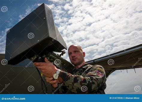 Soldier Presents Electronic Rocket Launcher Editorial Image Image