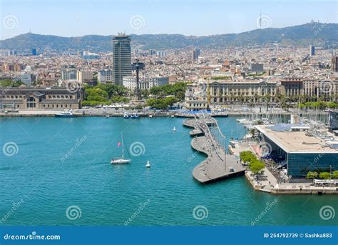 Yacht Sails on Blue Water of Sea in City Port of Barcelona Editorial ...