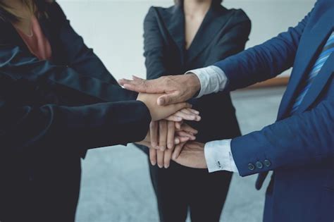 Premium Photo Midsection Of Business People Stacking Hands