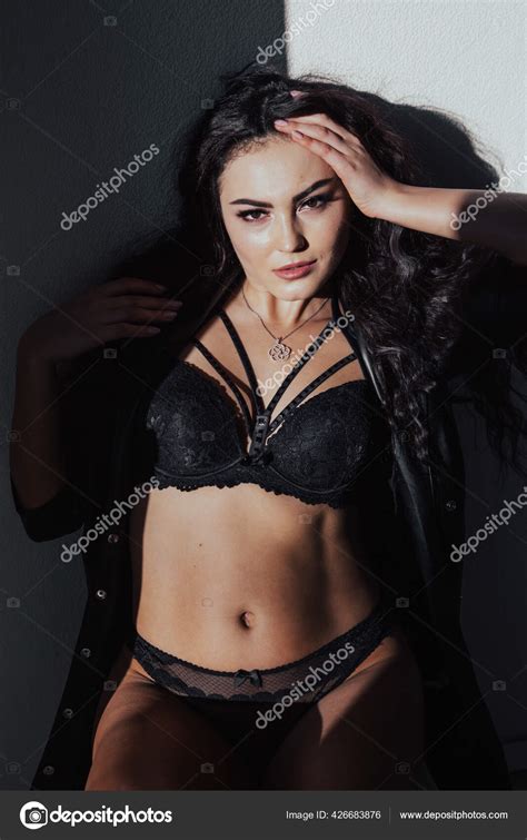 Portrait Of A Beautiful Brunette Woman In Black Lingerie Posing Stock Photo Dsimakov Foto