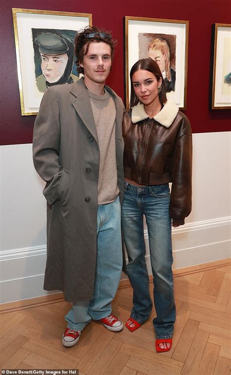 Cruz Beckham, 20, takes his mind off the family feud as he enjoys a