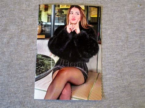 CUTE BRUNETTE MODEL IN SHORT SKIRT POSING LEGS CROSSED IN BLACK PANTYHOSE PHOTO EBay