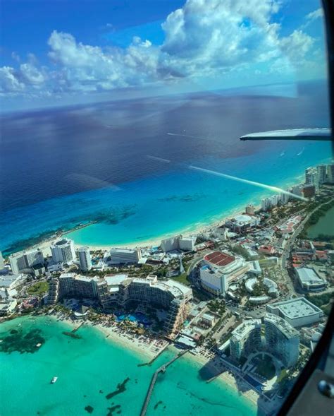 Vuelo panorámico a la Zona Hotelera de Cancún e Isla Mujeres GetYourGuide