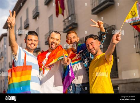 Gay Pride Party In The City Portrait Of Couples Of Men Having Fun At The Demonstration With The