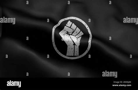 Frontal View Of The Black And White Fist Of Power Flag Flapping In Hd