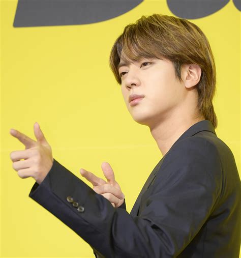 BTS member Jin to begin mandatory military service on Dec. 13