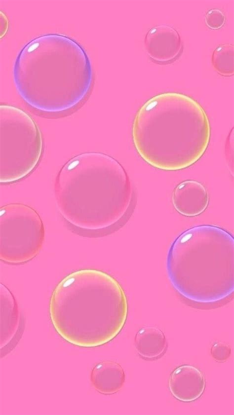 Pink And Purple Bubbles Floating On Top Of Each Other