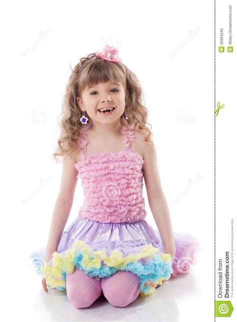 Fille Bouclée De Sourire Posant Dans Le Costume De Sucrerie Photo stock