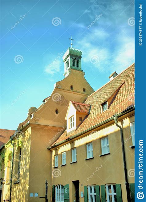 Buildings in the Old Fuggerei in Augsburg in Germany 4.7.2020 Editorial ...