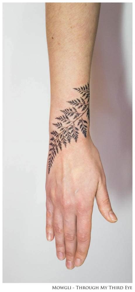 Fern Leaf Tattoo On The Right Wrist Titled