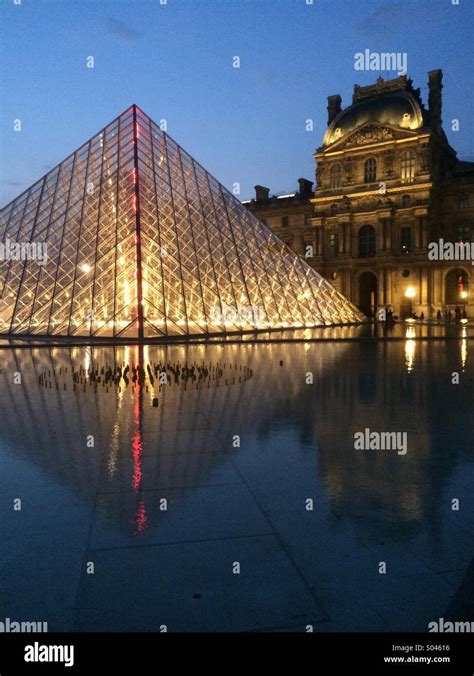 The Louvre at night Paris Stock Photo - Alamy