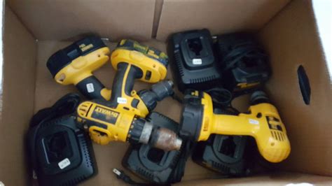 Three Dewalt 18 Volt Drills With Batteries And 5 Chargers