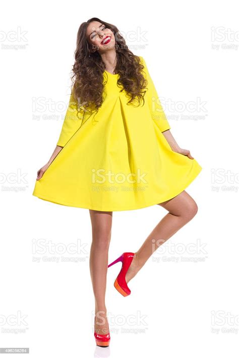 Happy Fashion Model Posing On One Leg Stock Photo Download Image Now