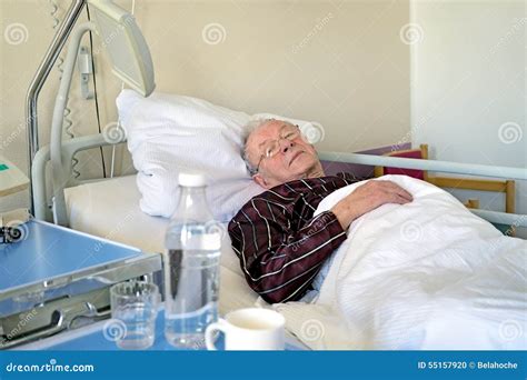 Senior Man Asleep In Hospital Bed Royalty-Free Stock Photo ...