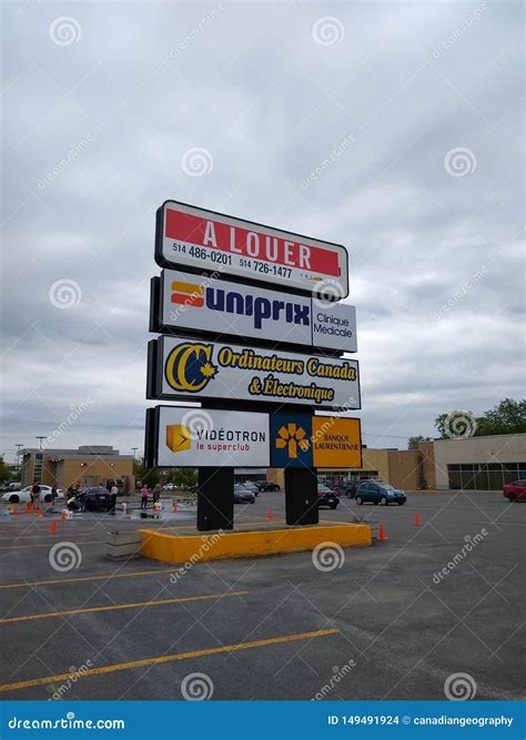 Signs Of The Several Stores On Boulevard Taschereau In Greenfield Park