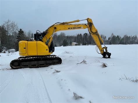 New Holland E140 C SR Kaivinkone 2015 Nettikone