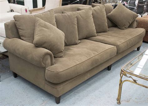 COCO REPUBLIC SOFA, large brown corduroy upholstered with arched back and scatter cushions ...