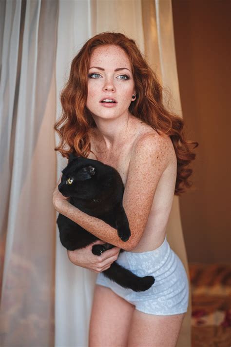 Oksana Butovskaya And Her Cat Porn Pic