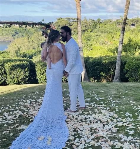 Becky Lynch And Seth Rollins Wedding Day Picture With Their Baby