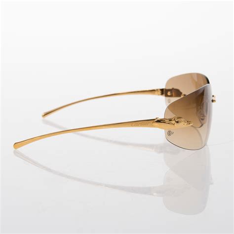 A Pair Of Panthère De Cartier Sunglasses Bukowskis