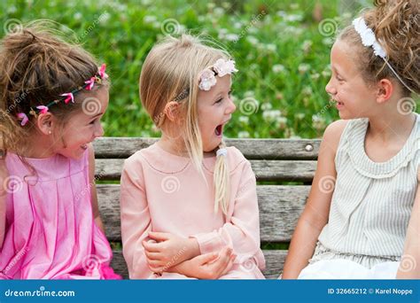 Girl Friends Having A Laugh In Park Stock Photography Image 32665212