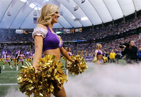 A Minnesota Vikings Cheerleader Performs Before An Nfl Football Game Between The Vikings And The