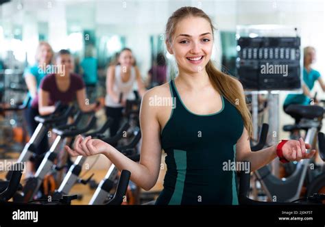 Blonde Woman Posing In Modern Gym Stock Photo Alamy