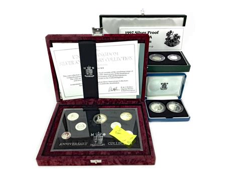 Lot 72 - THREE THE ROYAL MINT SILVER COIN SETS