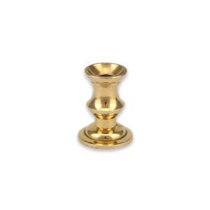 A Brass Plated Candle Holder On A White Background