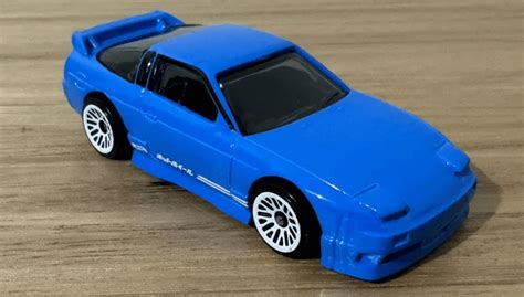 Машинка Базова Hot Wheels 96 Nissan 180SX Type X The 90S 1 64 HTB08 Blue замовляйте в