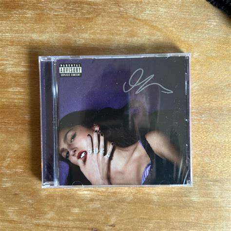 sealed signed olivia rodrigo cd brand... - Depop