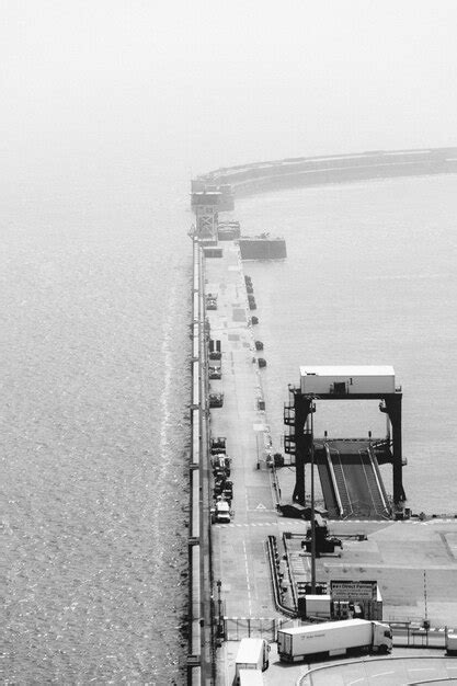 Premium Photo High Angle View Of Commercial Dock Against Sea