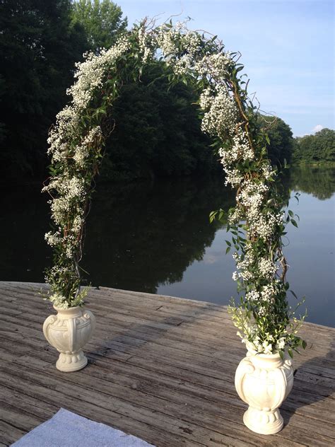 Rustic Wedding Arch Composed Of Curly Willow Italian Ruscus Greenery