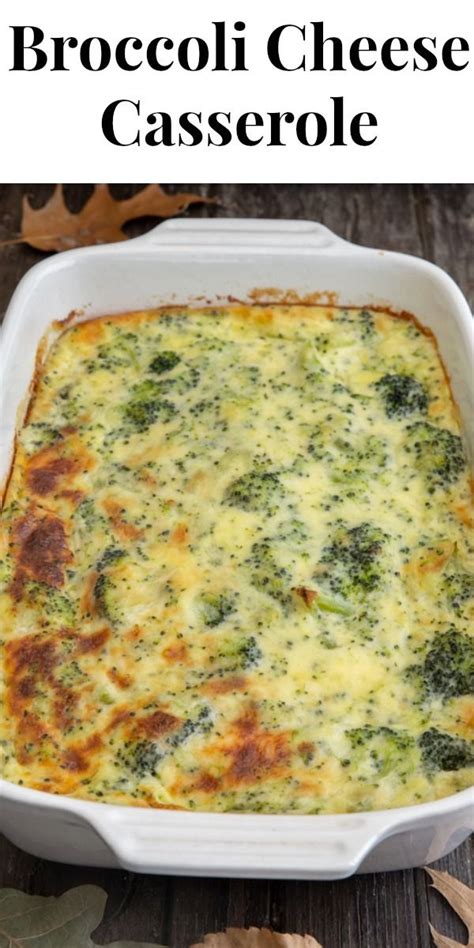 Broccoli Cheese Casserole In A White Dish With Leaves On The Side