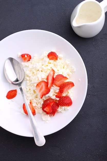 Premium Photo Healthy Breakfast Cottage Cheese With Strawberries In