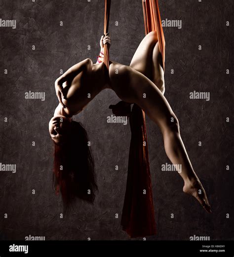 Beautiful Nude Dancer On Aerial Silk Graceful Contortion Acrobat Performs A Trick On A Ribbons
