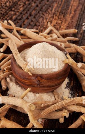 Ashwagandha Powder In Wooden Bowl Stock Photo Alamy