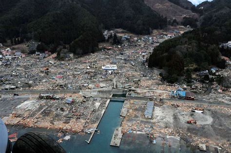 An aerial view of damage to Wakuya, Japan after a 9.0 magnitude earthquake and subsequent ...