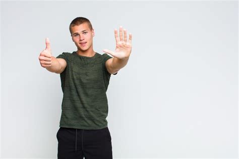 Premium Photo Blonde Man Smiling And Looking Friendly