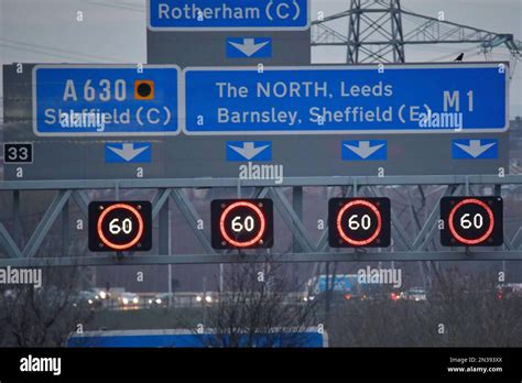 Signs and variable speed limits above each lane of the m1 motorway ...